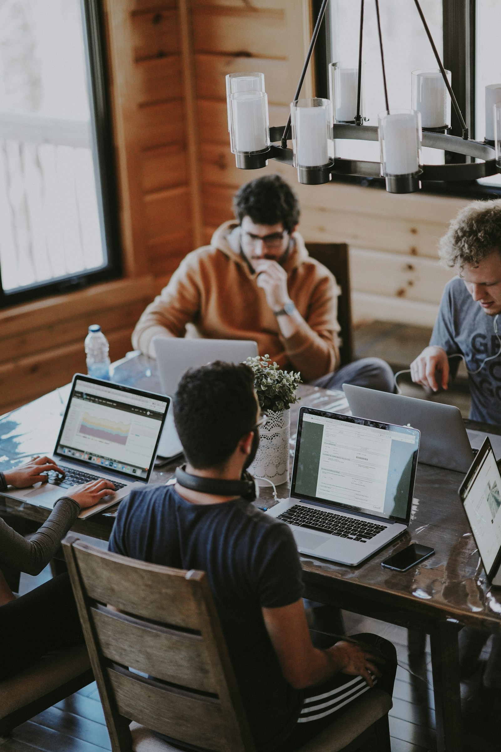 A professional team discussing a client brief in a modern office
